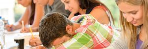 15231184 - high-school student falling asleep in class teens lesson college bored