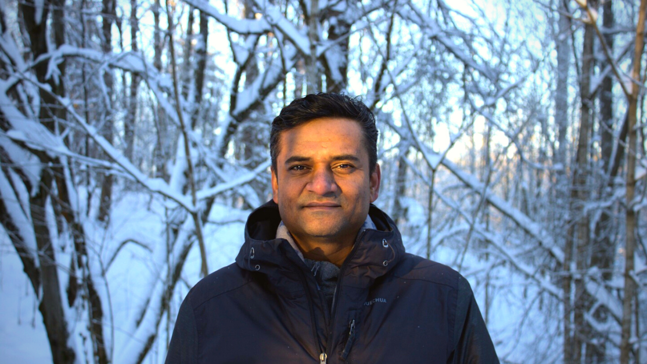 Ashish in a snowy forest