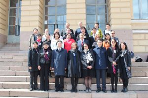 Sun was shining on the guests of the opening event at the steps leading to the main building of University of Helsinki
