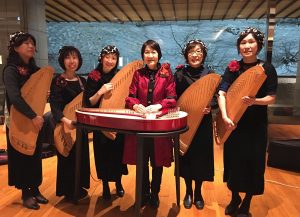 Six Japanes women posing with kantele's in their hands